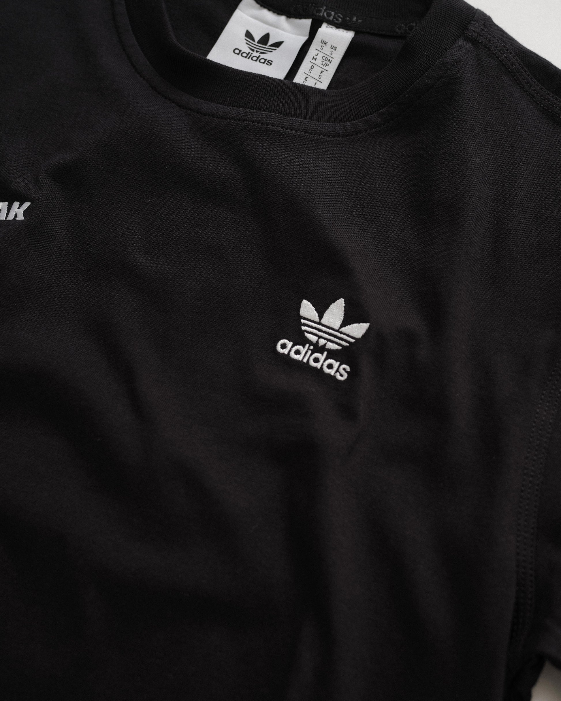 Outbreak® x adidas Essentials T-Shirt